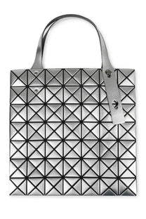 Silver geometric tote bag with triangular pattern and metallic handles from bao bao issey miyake women’s platinum collection
