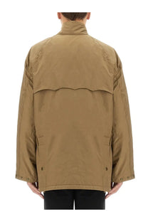 Baracuta men’s bedale beige trench coat with high collar buttoned cuffs and two flap pockets in tan color