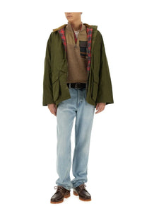 Olive green hooded field jacket with red and black plaid lining by baracuta in miller jersey beige design