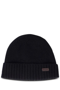Barbour men’s cap carlton black is a black ribbed knit beanie with a folded cuff and a metallic brand tag on the side