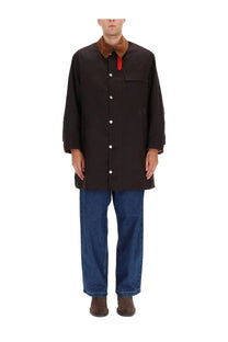 Barbour men’s waxed cotton jacket in black with brown collar and red inner lining detail