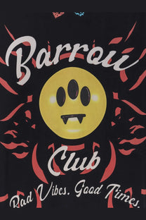 Yellow smiley face with black paw-print eyes and fangs printed on barrow men’s black cotton shirt front
