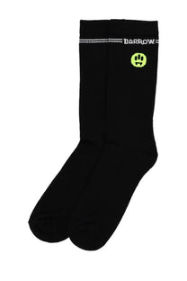 Barrow unisex black crew socks with neon green smiley face logo and white barrow lettering on front side