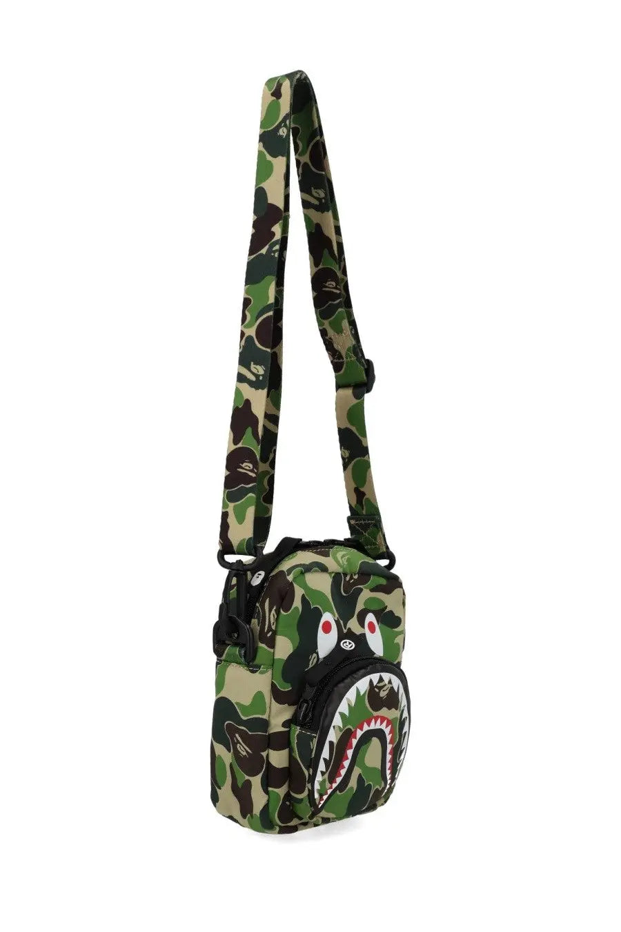 A bathing ape men’s borsa abc camo shark mini crossbody bag in green brown and black camouflage pattern