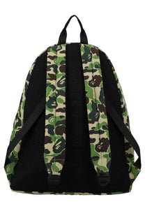 A bathing ape men’s zaino con stampa shark green backpack with green and brown camouflage pattern and black mesh straps