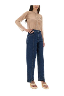 Baum und pferdgarten women’s cardigan crisje beige paired with high-waisted dark blue denim trousers with frayed hems