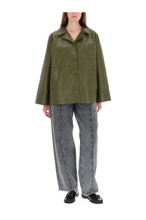 Baum und pferdgarten women’s jeans nara black paired with an olive green faux leather button-up jacket with relaxed fit and texture