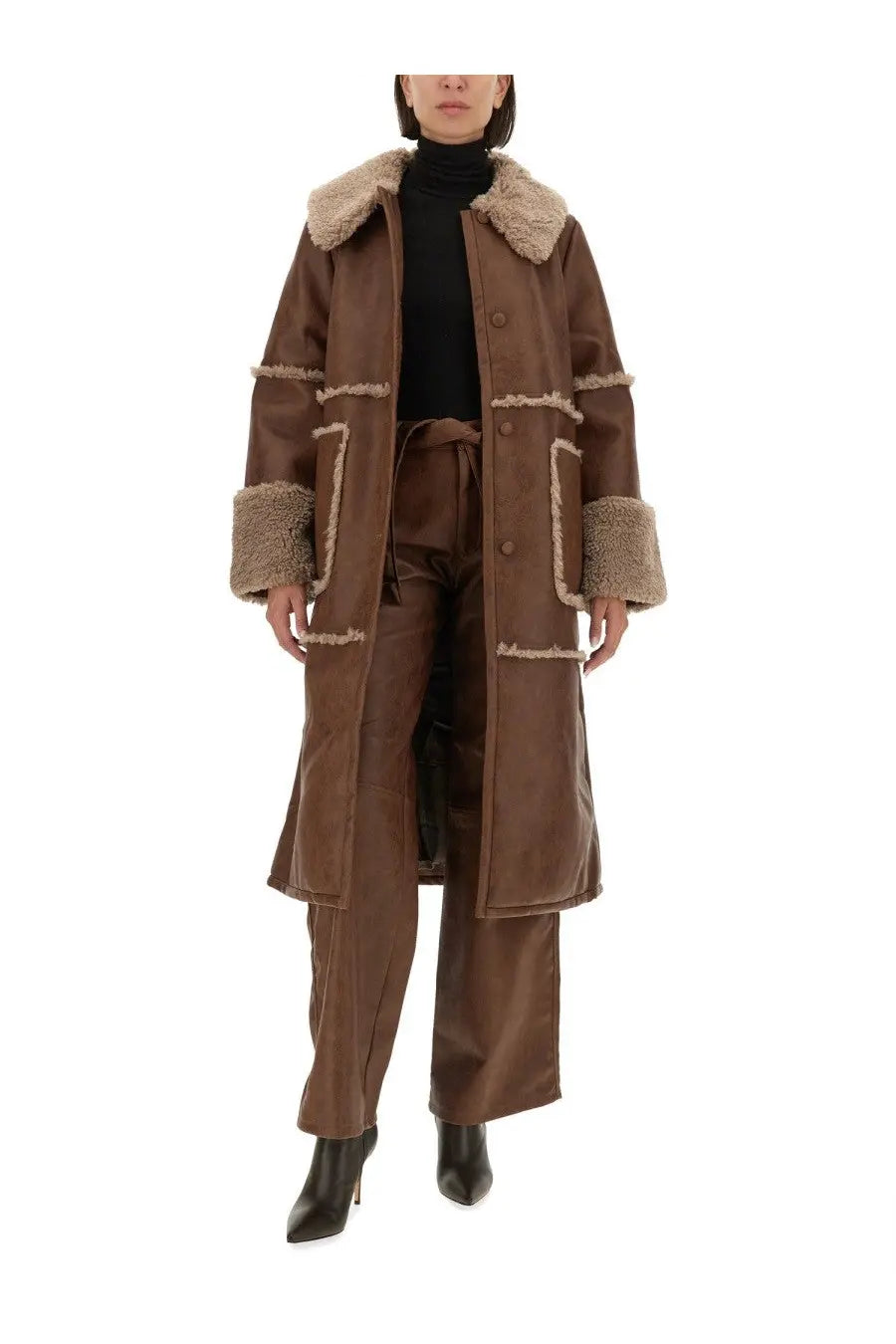 Brown shearling-lined coat with plush light beige fur trim on collar and cuffs paired with baum und pferdgarten nadene pants brown