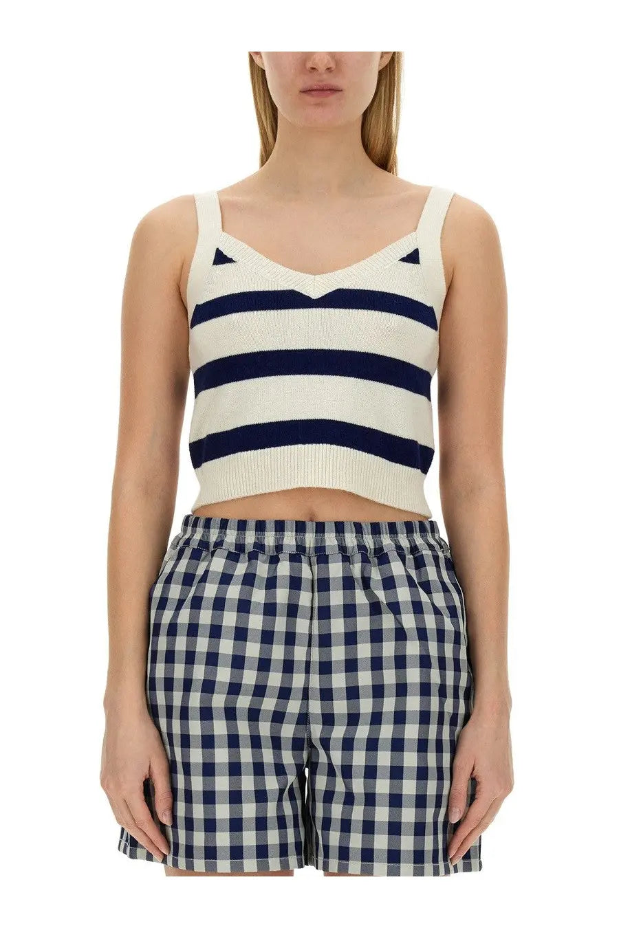 Navy and cream striped knit crop top with triangle shoulder details from baum und pferdgarten women’s collection