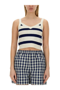 Navy and cream striped knit crop top with triangle shoulder details from baum und pferdgarten women’s collection