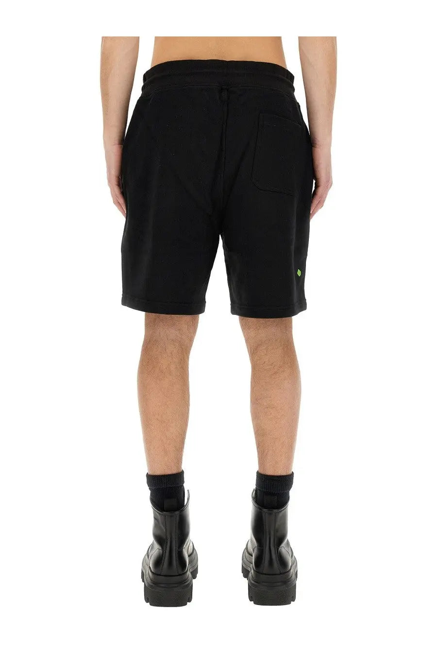 Belstaff men’s black cotton shorts with a drawstring waistband and a small green logo on the lower right leg