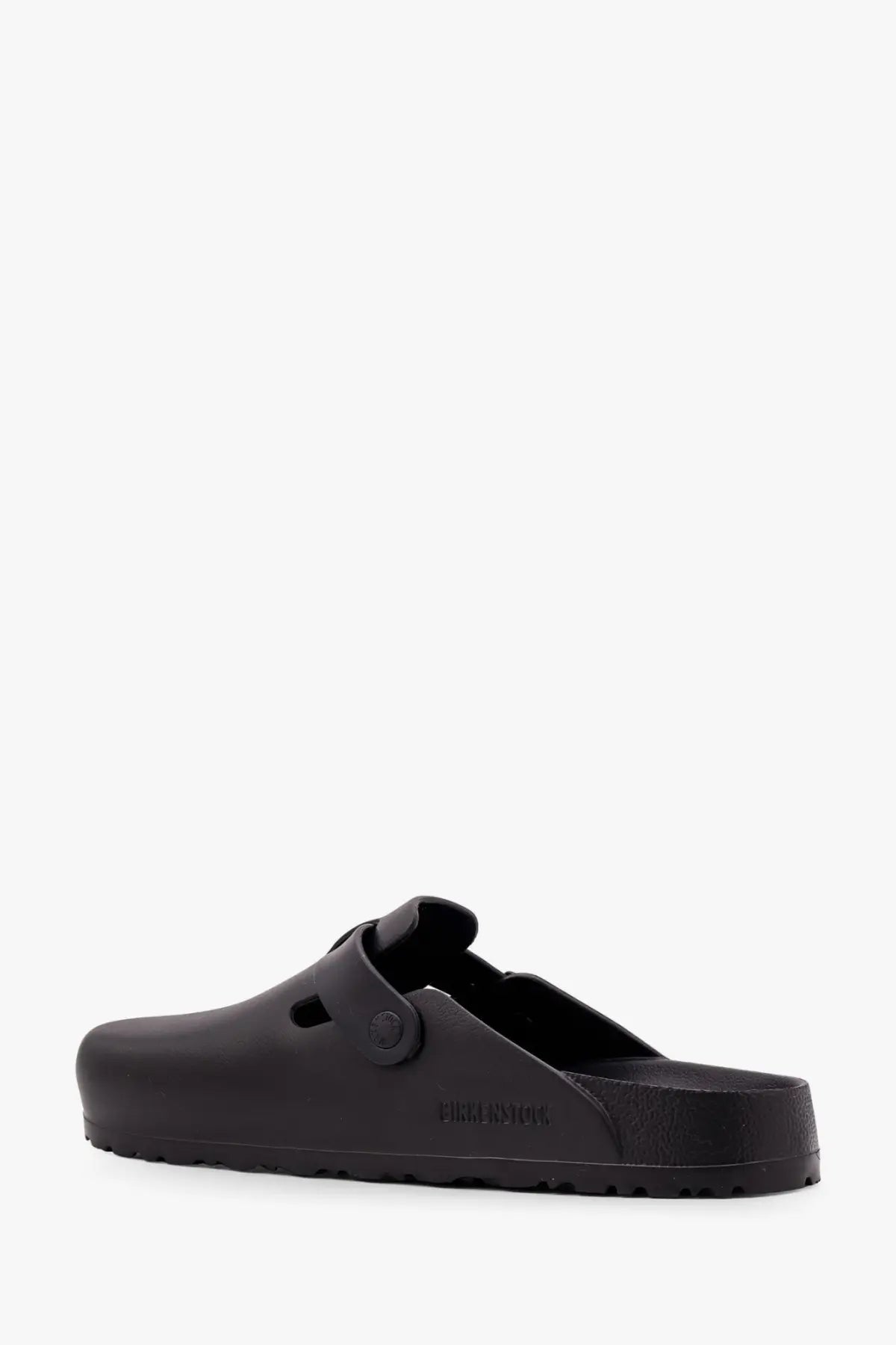 Birkenstock men’s Boston leather sandals in black with matte finish and adjustable strap shown from the back side