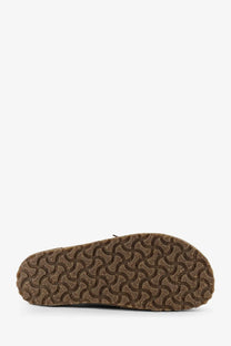 Brown rubber sole with a distinctive wavy interlocking pattern on birkenstock men’s suede lace grey shoes