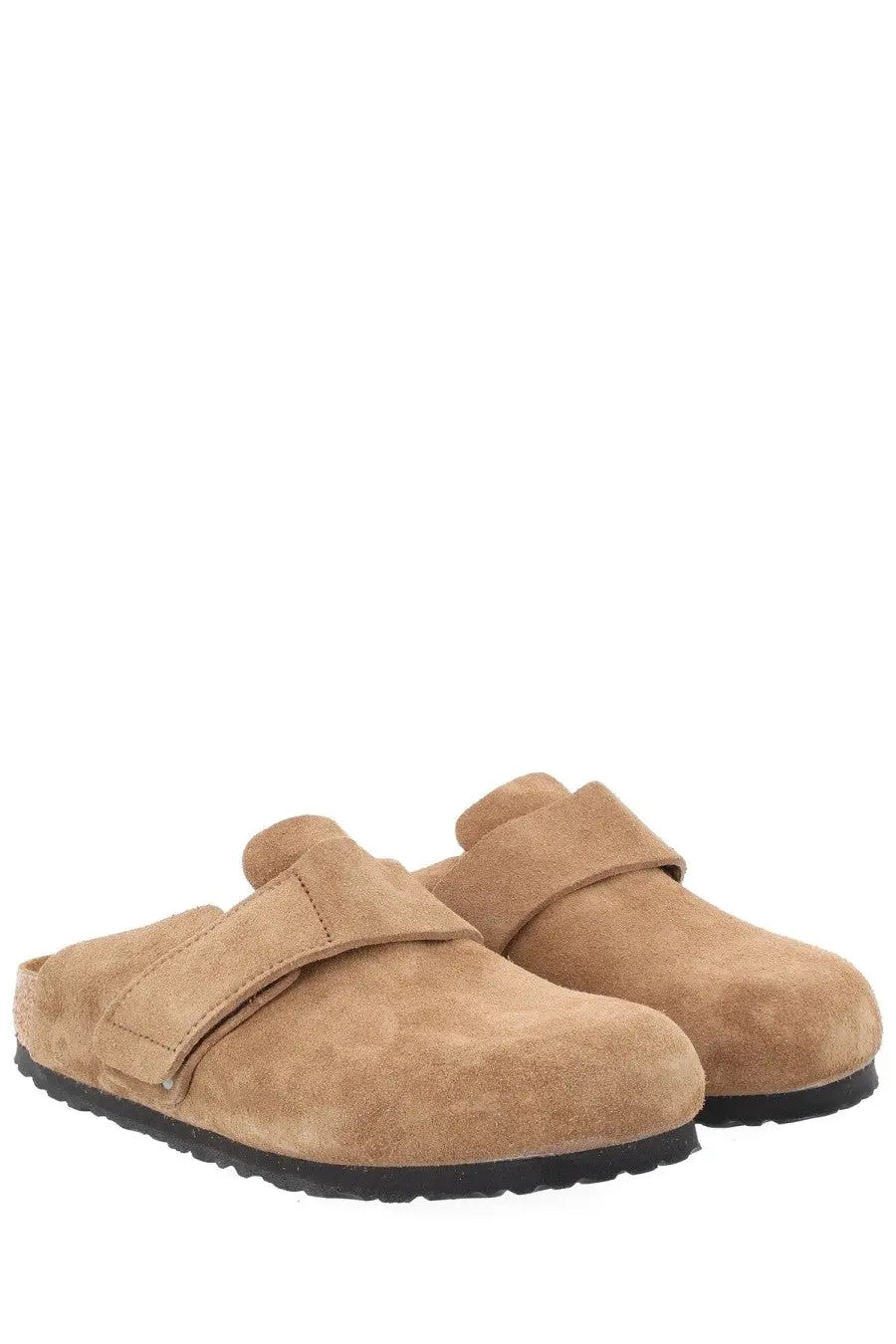 Birkenstock unisex mule loma brown tan suede clogs with black rubber sole and velcro strap visible from the back
