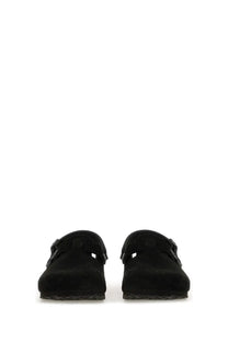 Birkenstock unisex sabot Boston black black suede clogs with classic two strap design shown from the back side