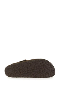 Brown suede birkenstock unisex sabot boston clog with textured rubber sole showing the back side