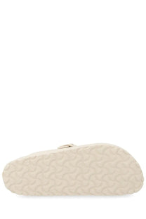 Birkenstock unisex sabot Boston white clog in cream with textured rubber sole and metallic buckle