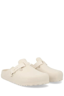 Cream-colored birkenstock unisex sabot boston white clogs with soft smooth leather upper and classic buckle strap design