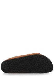 Birkenstock unisex sandal arizona brown featuring tan cork upper and black rubber sole with distinctive wavy tread pattern