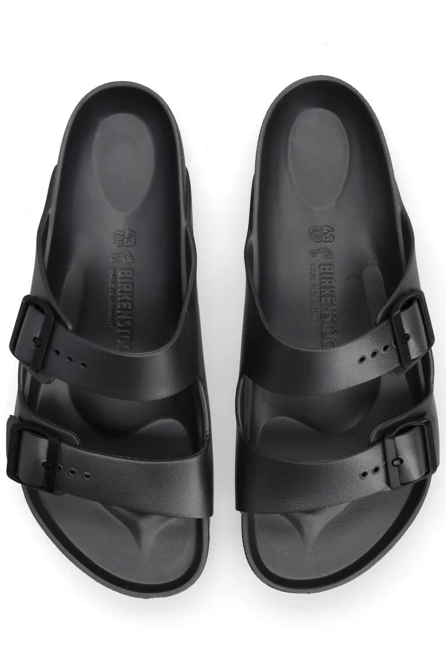 Birkenstock unisex sandal arizona grey with two adjustable black leather straps and a contoured footbed