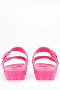 Birkenstock unisex sandal arizona pink bright pink rubber sandals with glossy finish and flower-shaped buckles