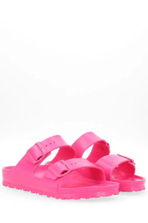 Birkenstock unisex sandal Arizona in bright pink with two adjustable straps and textured rubber sole