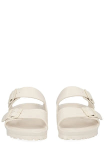 Birkenstock unisex sandal arizona white with cream-colored two adjustable straps and contoured footbed