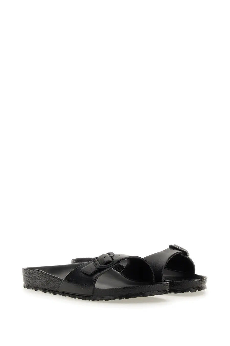 Birkenstock unisex sandal madrid black featuring black arizona sandals with buckle strap and textured rubber sole