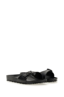 Birkenstock unisex sandal madrid black featuring black arizona sandals with buckle strap and textured rubber sole