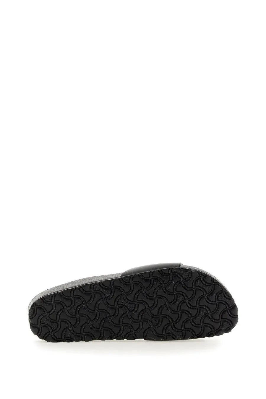 Black rubber sole with wavy interlocking pattern on the back of birkenstock unisex sandal madrid black