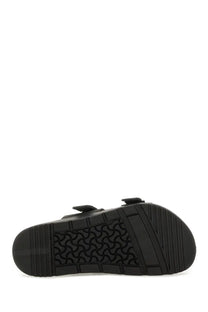 Birkenstock unisex sandal shinjuku black with black rubber sole textured wavy tread and two adjustable strap buckles