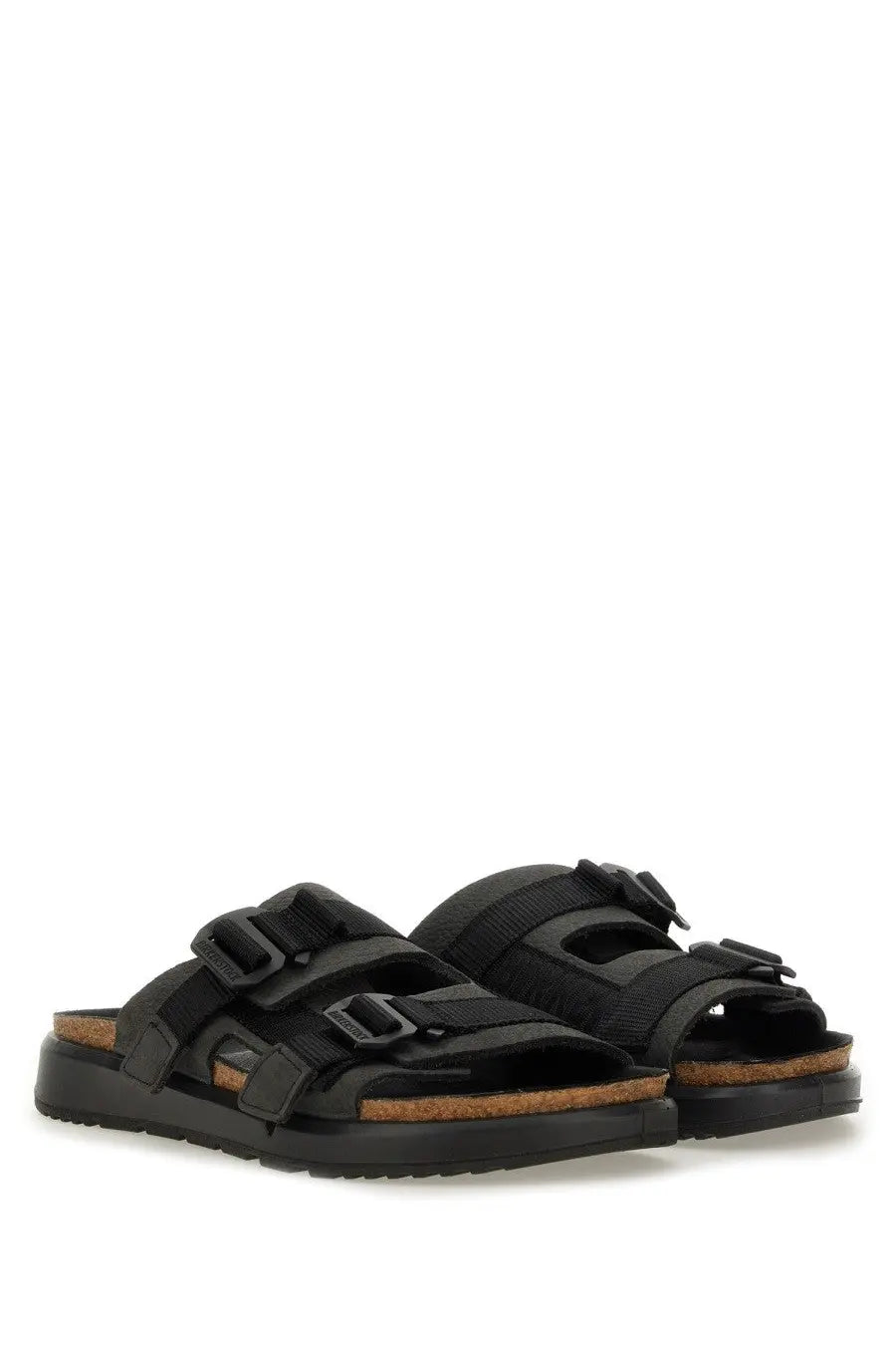 Birkenstock unisex sandal shinjuku black with black straps, two adjustable buckles, and cork insole