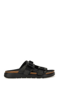 Black birkenstock unisex sandal shinjuku with two adjustable straps and cork footbed for comfortable wear