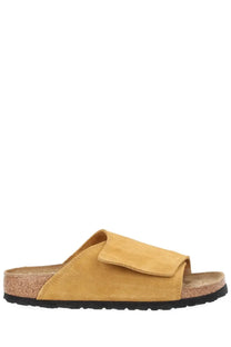 Birkenstock unisex sandal solana brown tan suede slip on with cork footbed and black rubber sole visible from the back