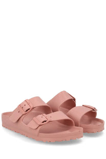 Pair of pink rubber birkenstock unisex sandalo arizona sandals with two adjustable buckle straps