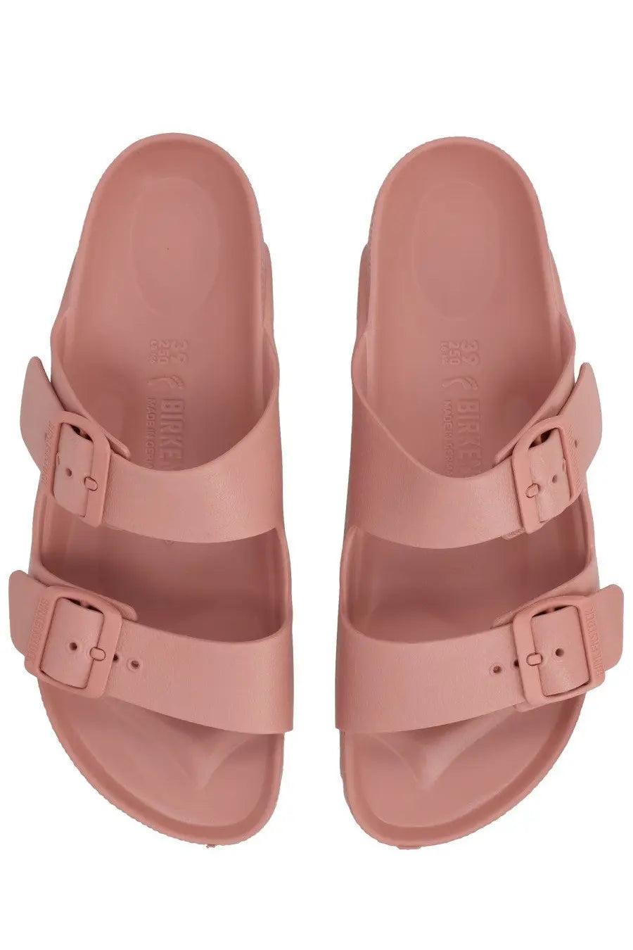 Pair of pink birkenstock unisex sandalo arizona sandals with two adjustable straps and buckle closures