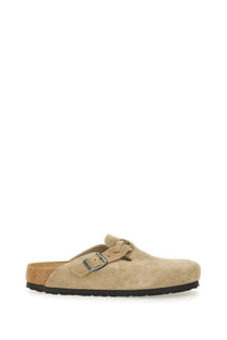 Beige suede birkiberg clog with cork footbed and black rubber sole from birkenstock unisex slipper sandal boston braided