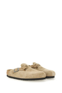 Beige suede birkiburs clog sandal with single buckle and cork footbed by birkenstock unisex slipper boston braided