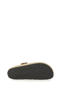 Beige suede birkenstock unisex slipper sandal boston braided with black rubber sole and wavy tread pattern