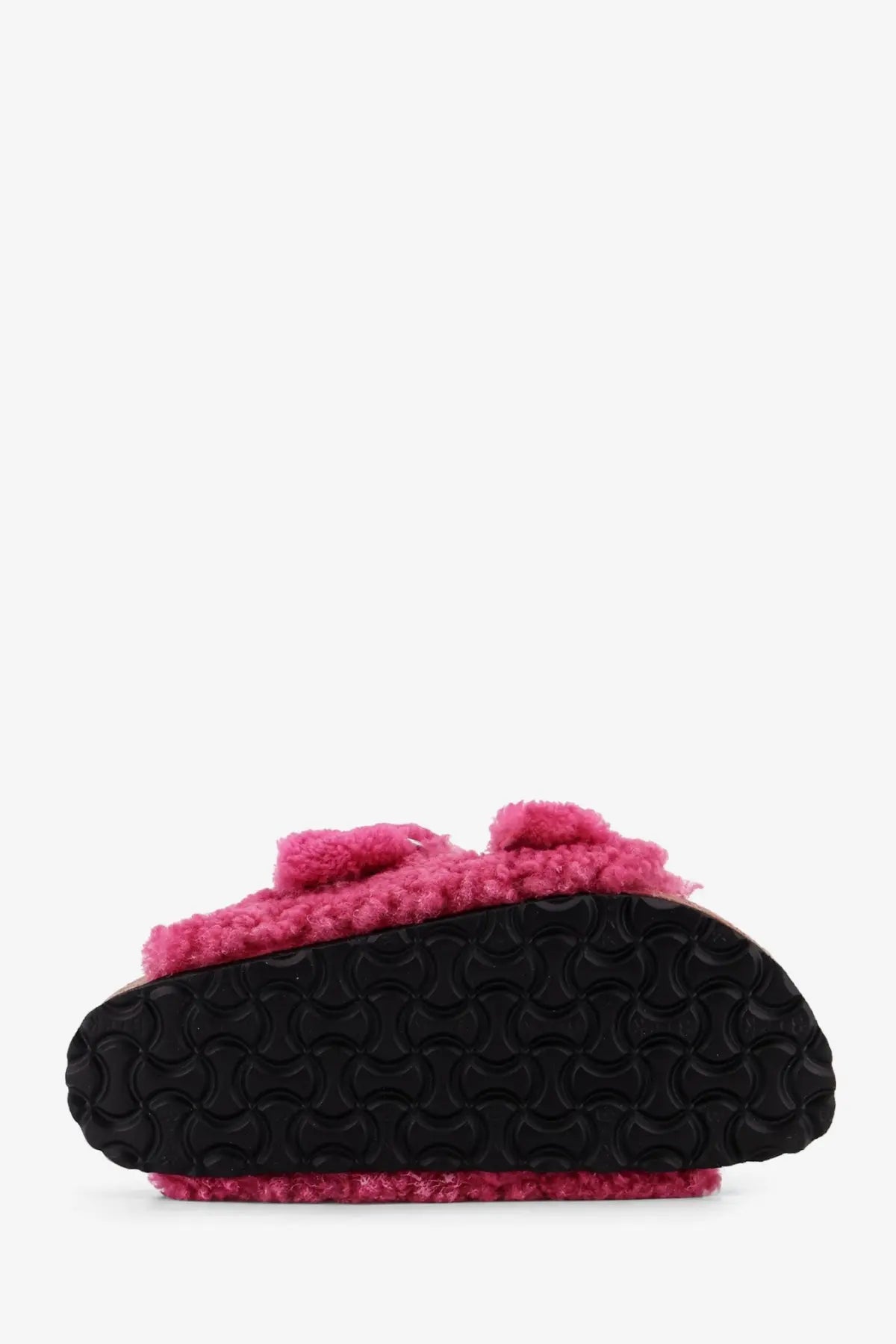 Pink birkenstock women’s arizona big buckle teddy slip-on mule with pink shearling and black rubber sole with logo tread