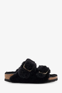 Birkenstock women’s arizona slide sandal in black shearling with gold-tone buckle accents