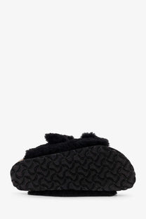 Birkenstock women’s arizona big buckle teddy sandal black slip-on with plush faux fur trim and textured rubber sole