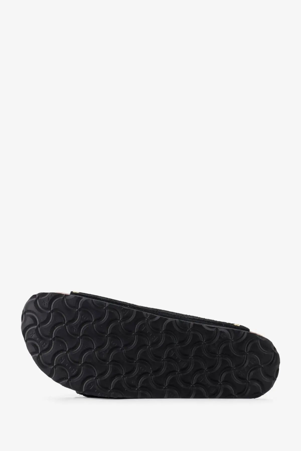 Black rubber sole with a distinctive wavy textured pattern on birkenstock women’s arizona rivet suede sandals black