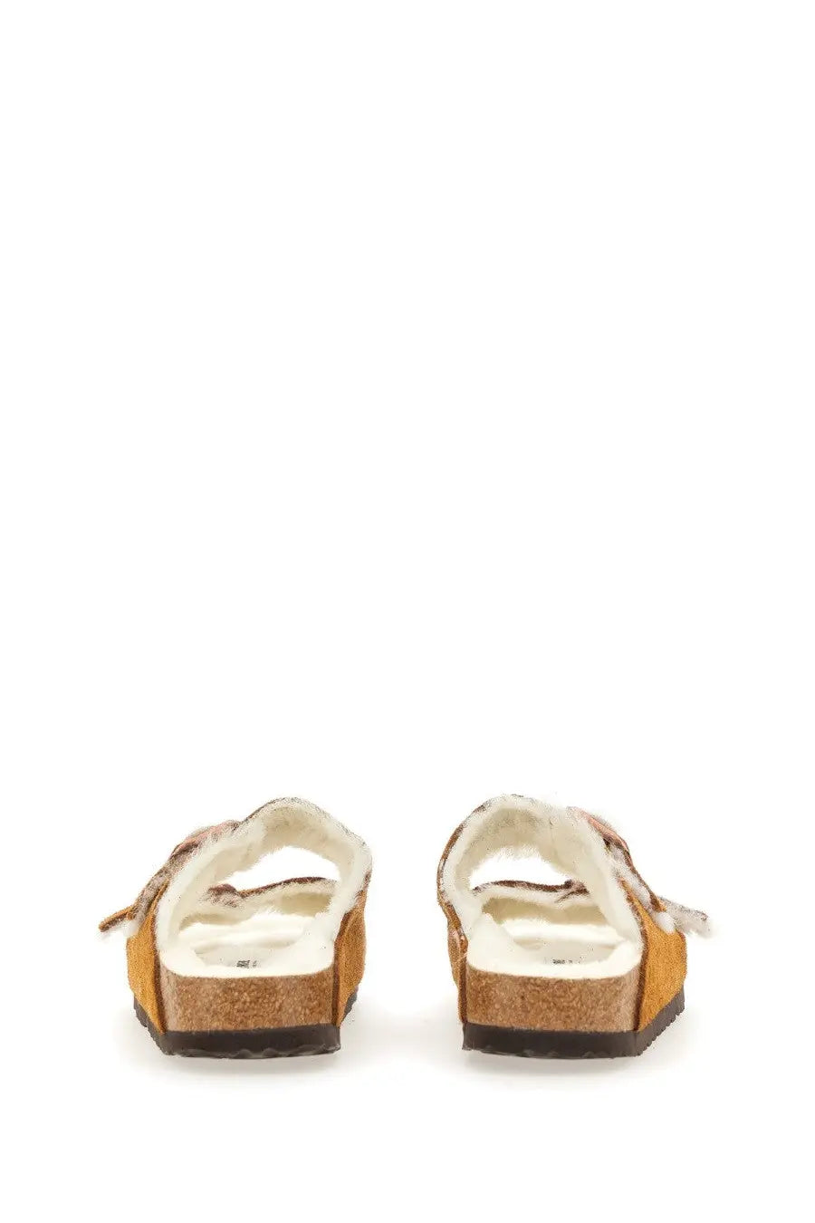 Birkenstock women’s Arizona sandal in mustard-yellow suede with cork footbed and white interior lining