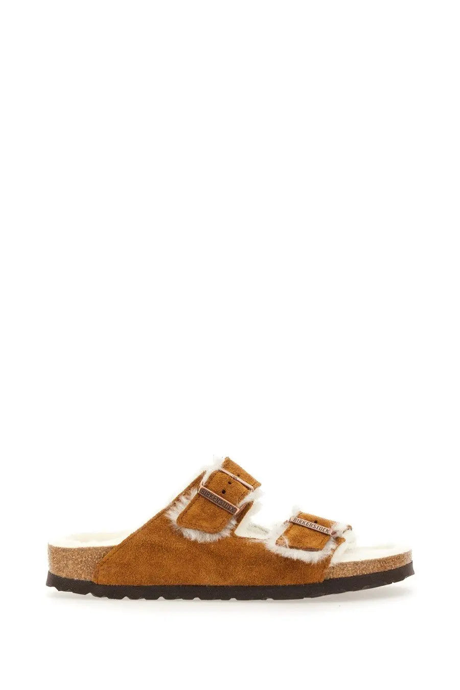 Birkenstock women’s arizona sandal in tan suede with two adjustable straps and plush white shearling lining