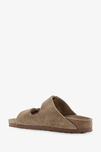 Birkenstock women’s arizona suede sandals beige with tan two-strap design and brown rubber sole