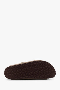 Birkenstock women’s arizona suede sandals in tan with a dark brown patterned rubber sole for casual wear