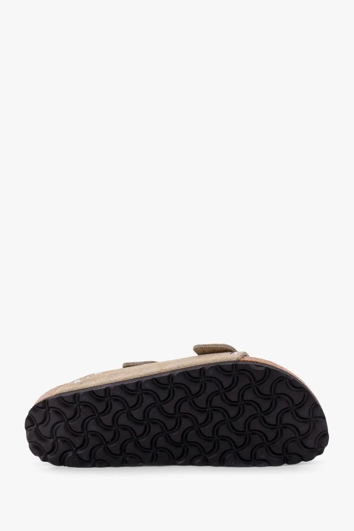 Beige suede birkenstock women’s arizona clog sandal with black rubber sole featuring a distinctive wavy pattern