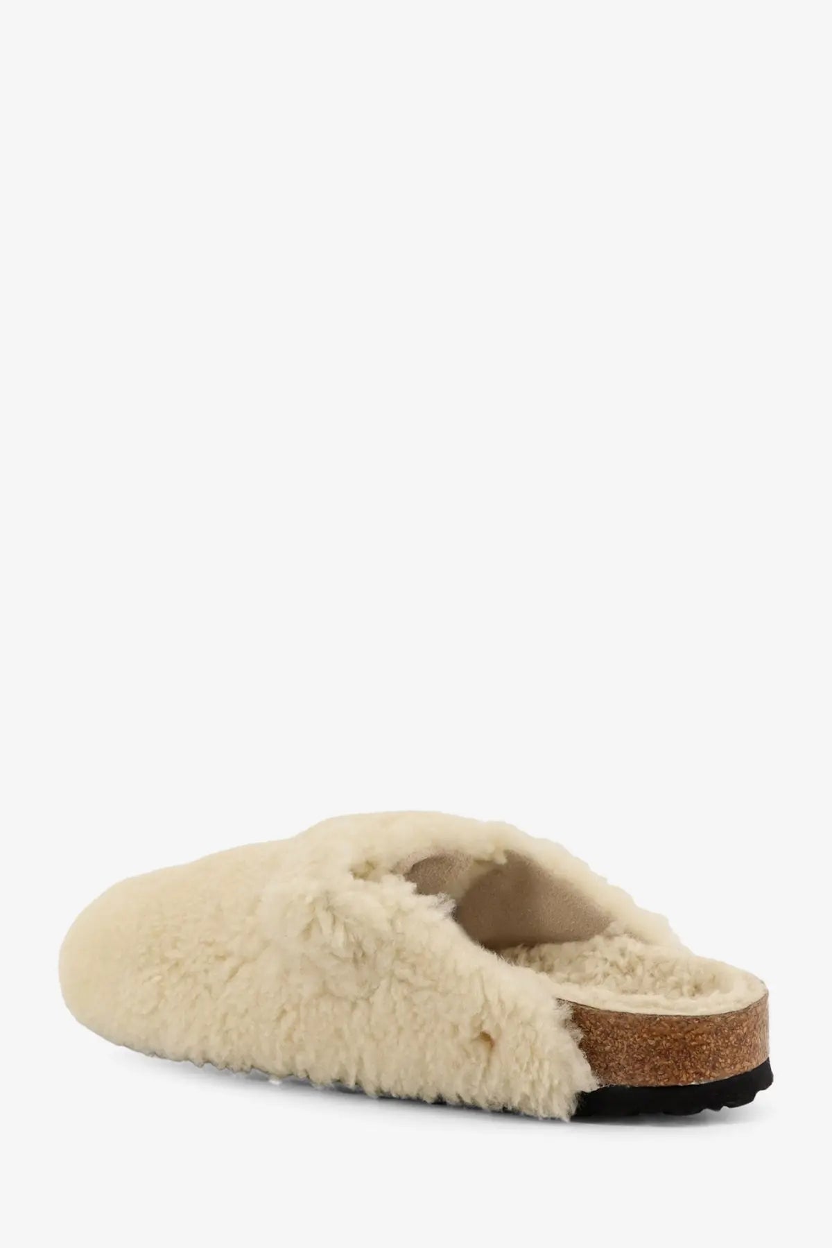 Birkenstock women’s boston big buckle shearling mule in white with cream-colored sheepskin lining cork footbed and black sole