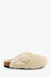 Birkenstock women’s boston big buckle shearling mule in cream with gold buckle and cork sole
